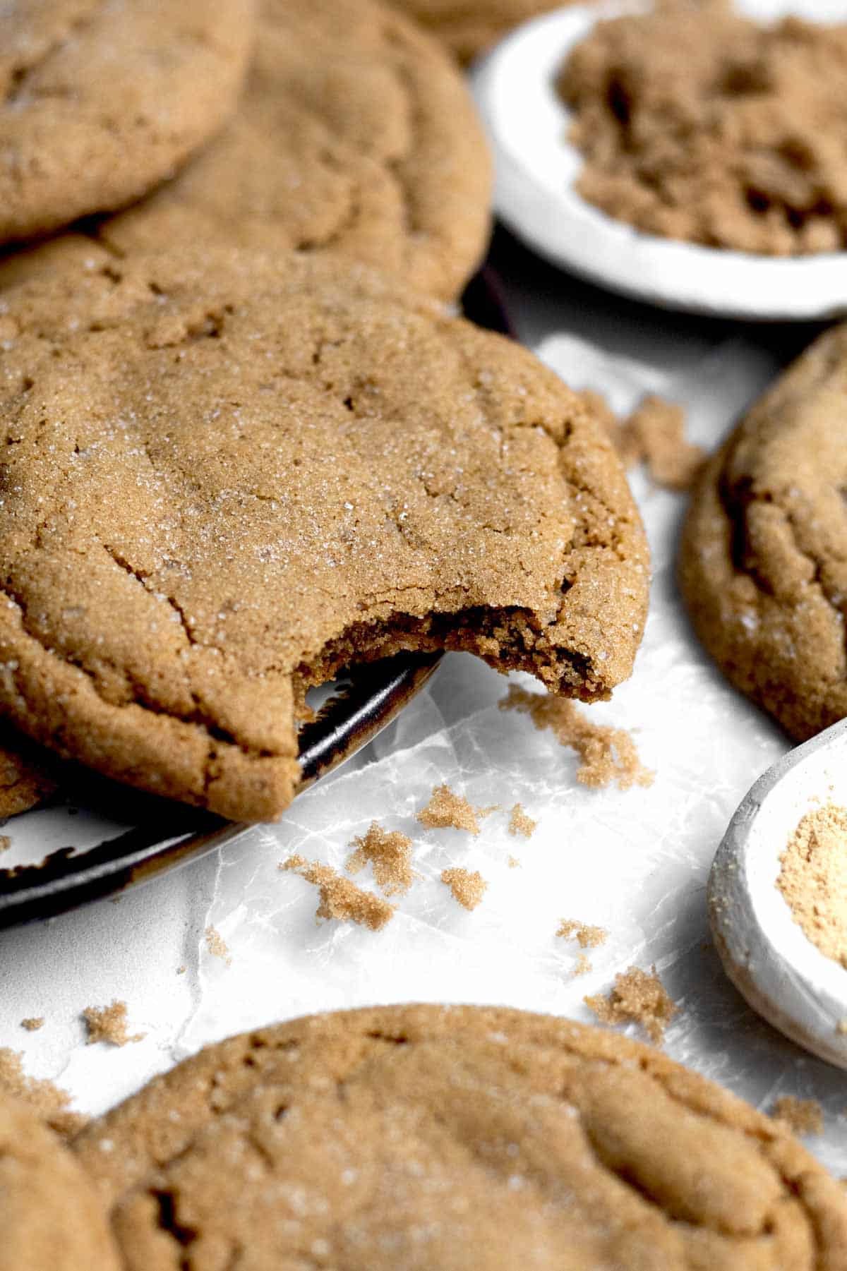 Gluten free and nut free Ginger Molasses Cookies on parchment paper.