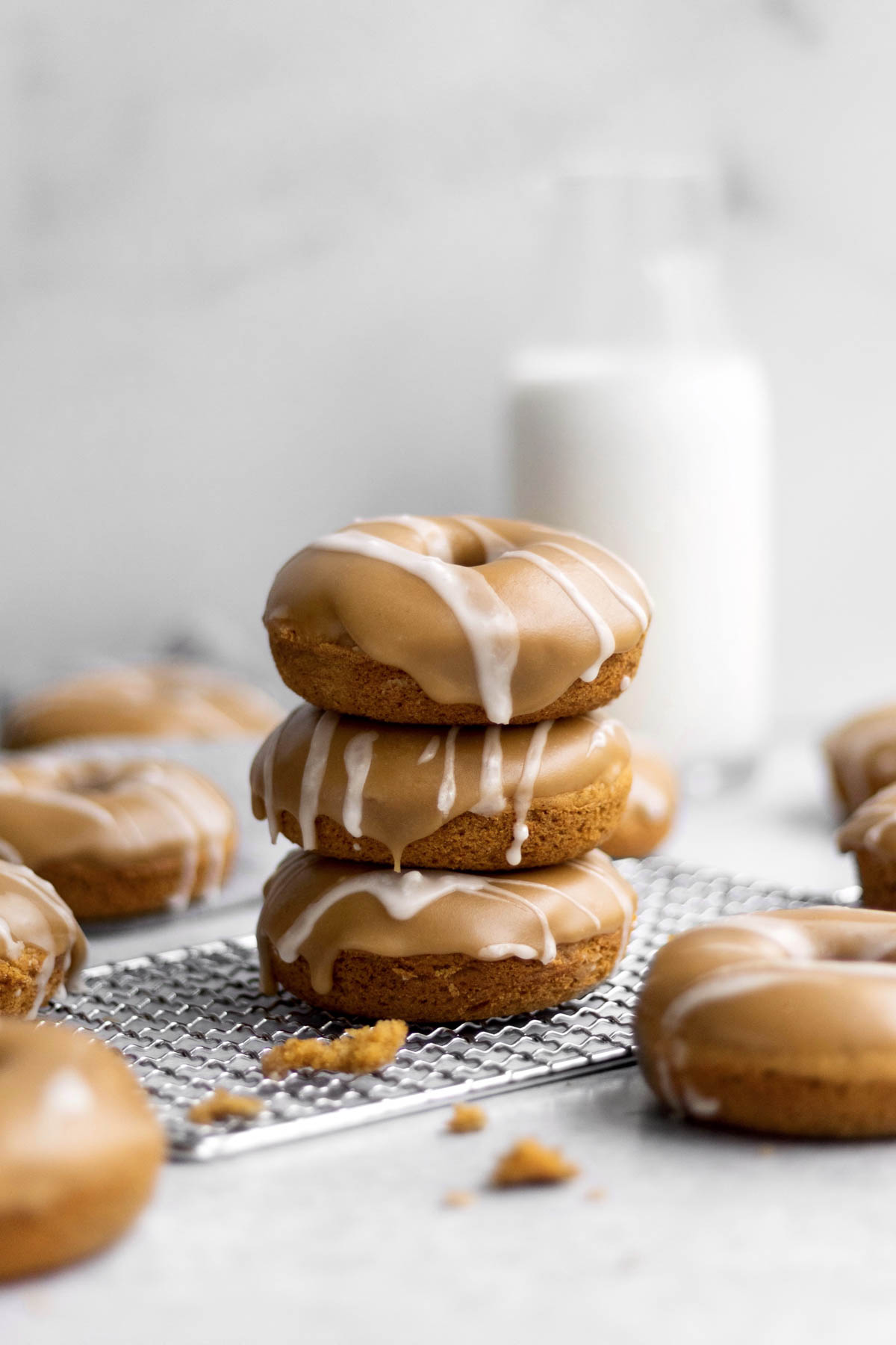 A stack of three gluten free and nut free Pumpkin Donuts.