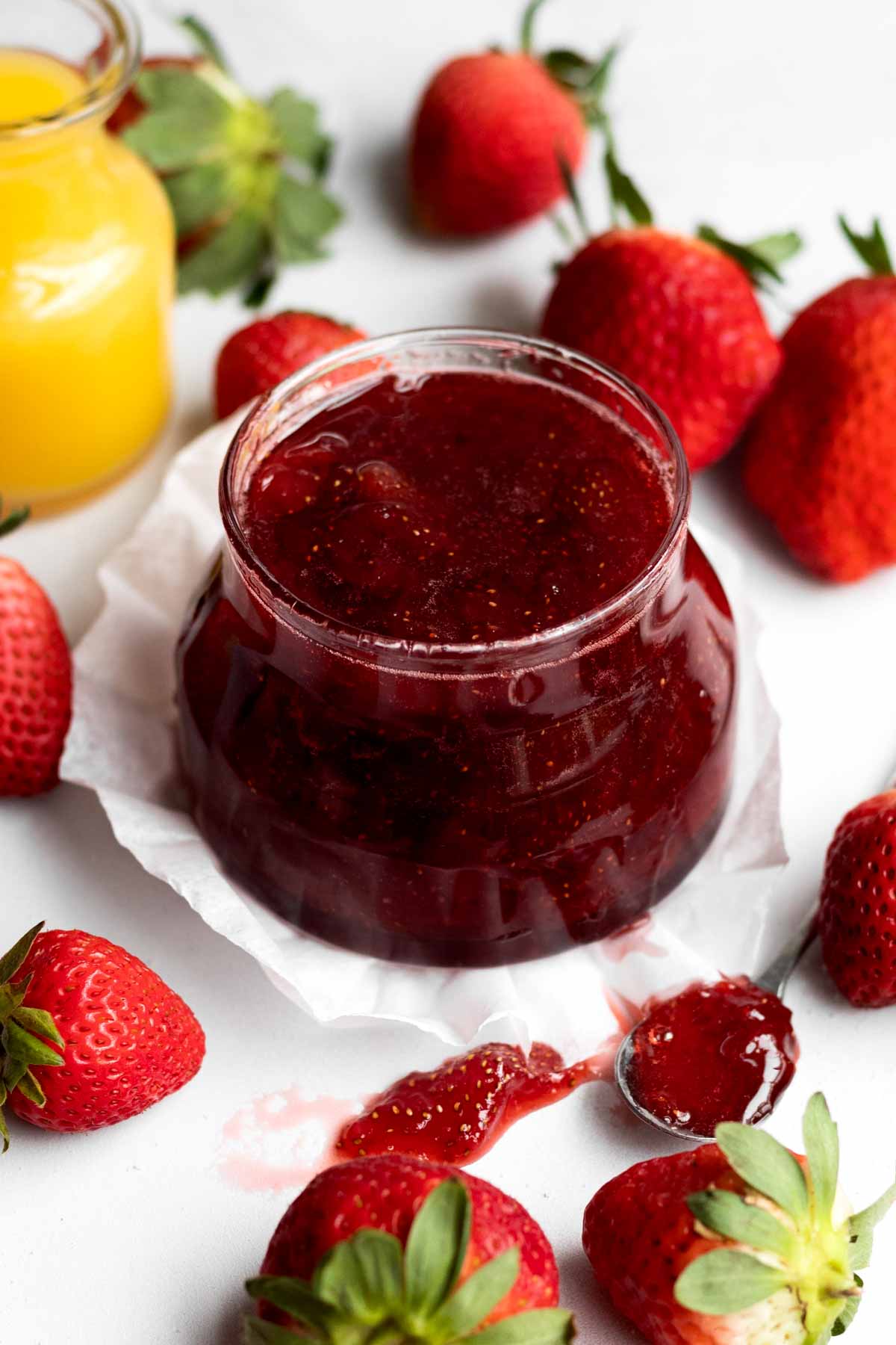 Gluten free Strawberry Sauce in a glass ramekin.