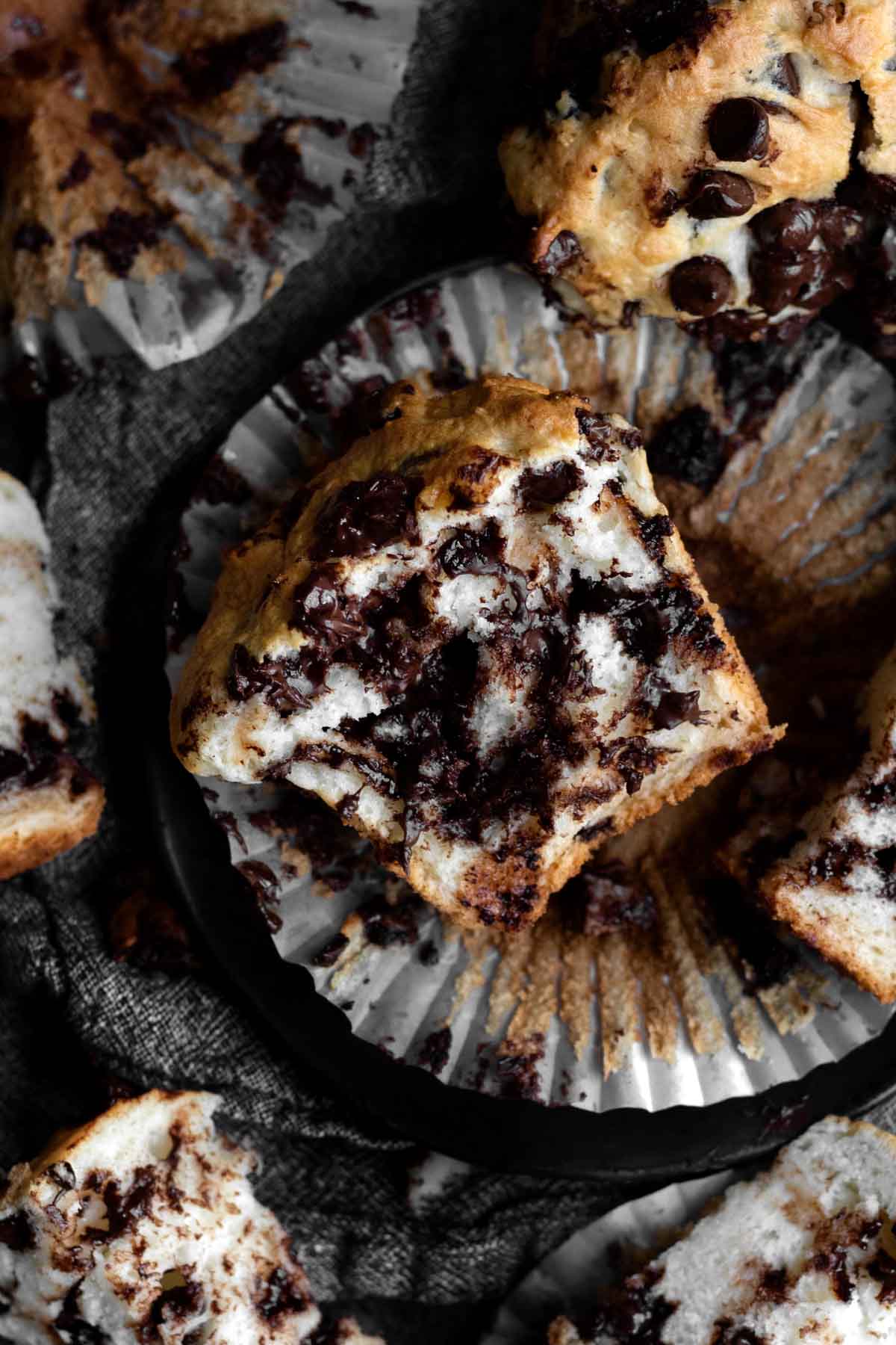 An insane amount of chocolate chips inside Bakery-Style Chocolate Chip Muffins.