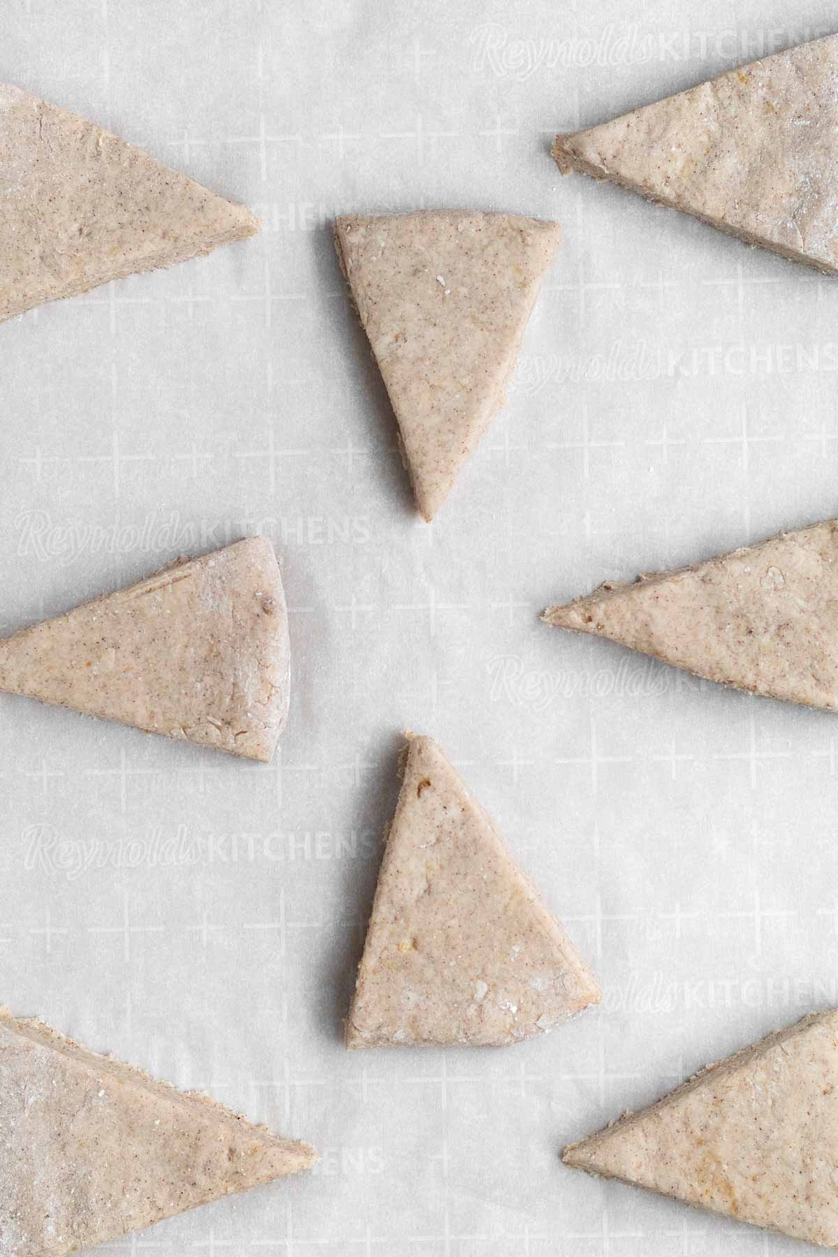Triangular wedges spaced out on parchment paper.