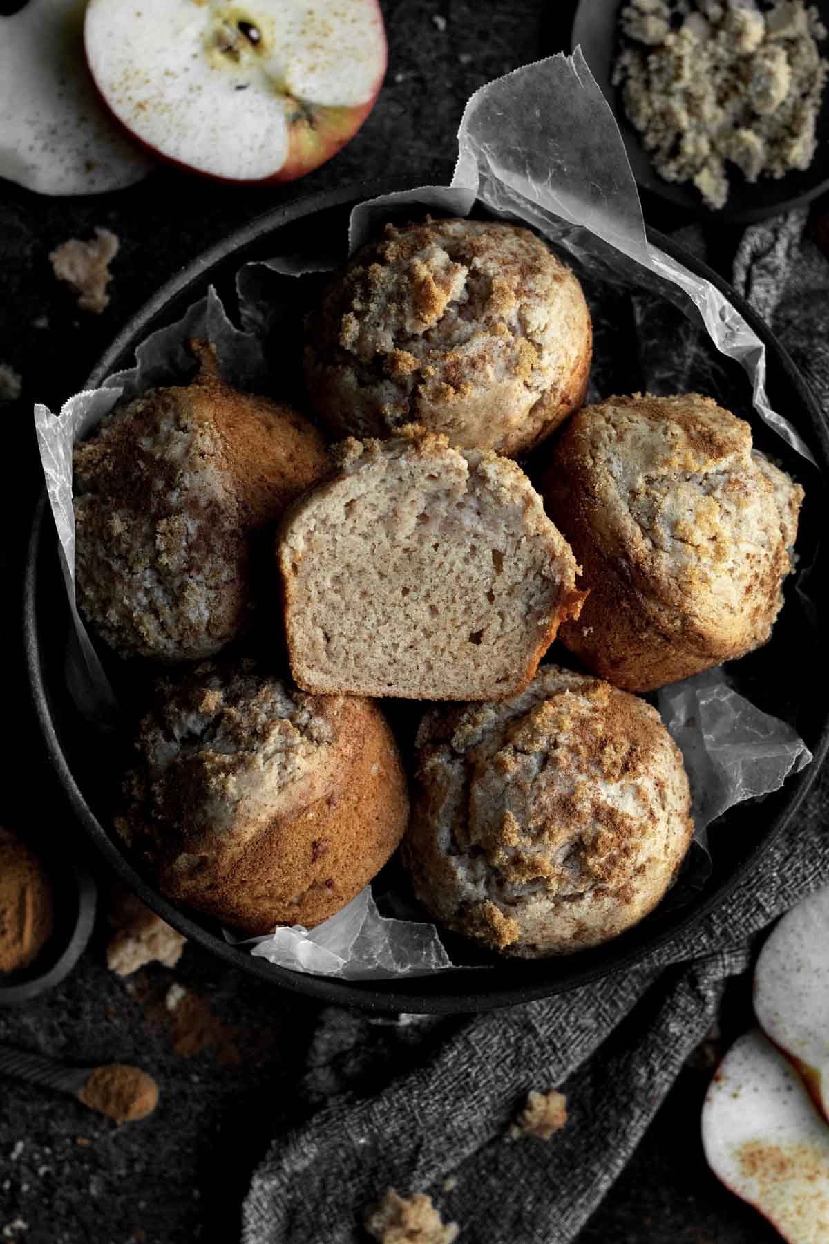 Gluten free Jumbo Apple Cinnamon Muffins served in a bowl.