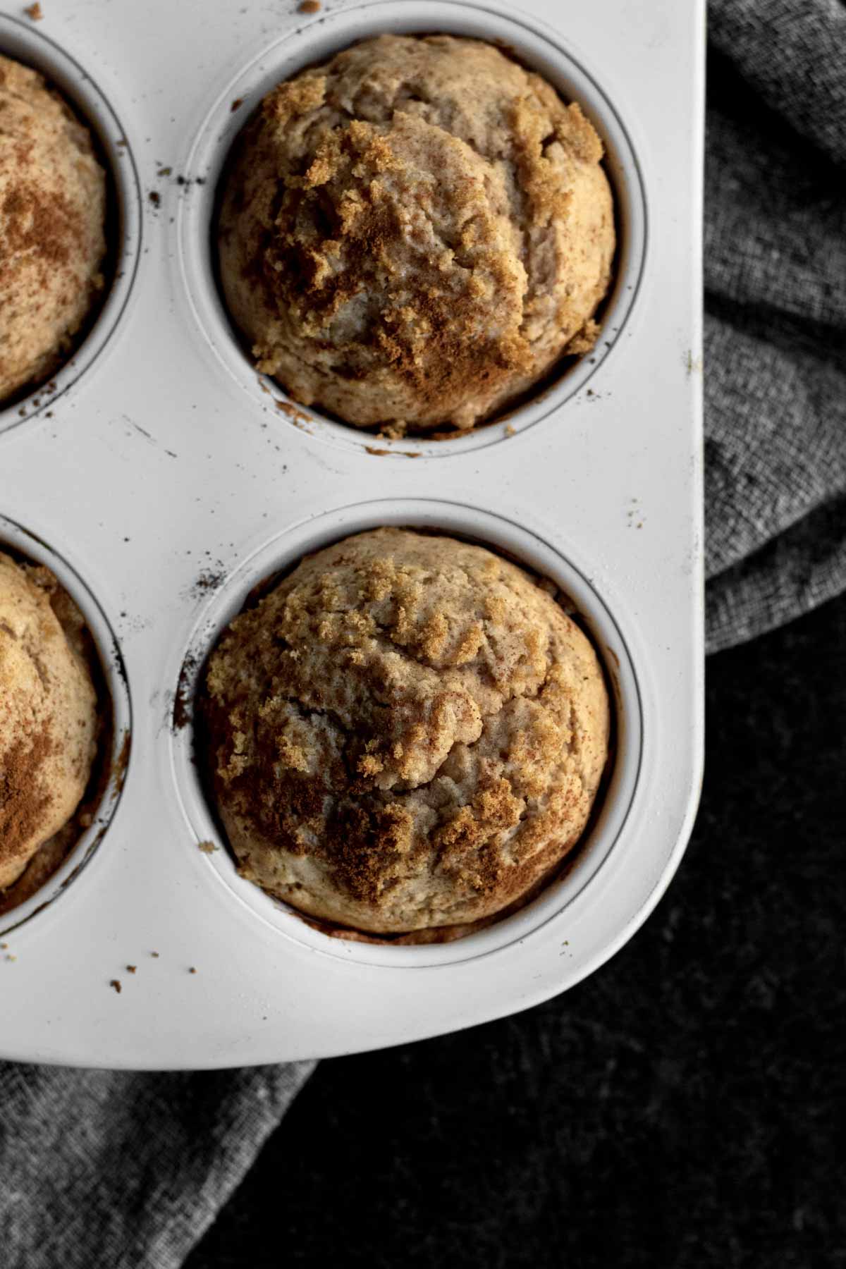 The Jumbo Apple Cinnamon Muffins are sitting in the muffin tray.