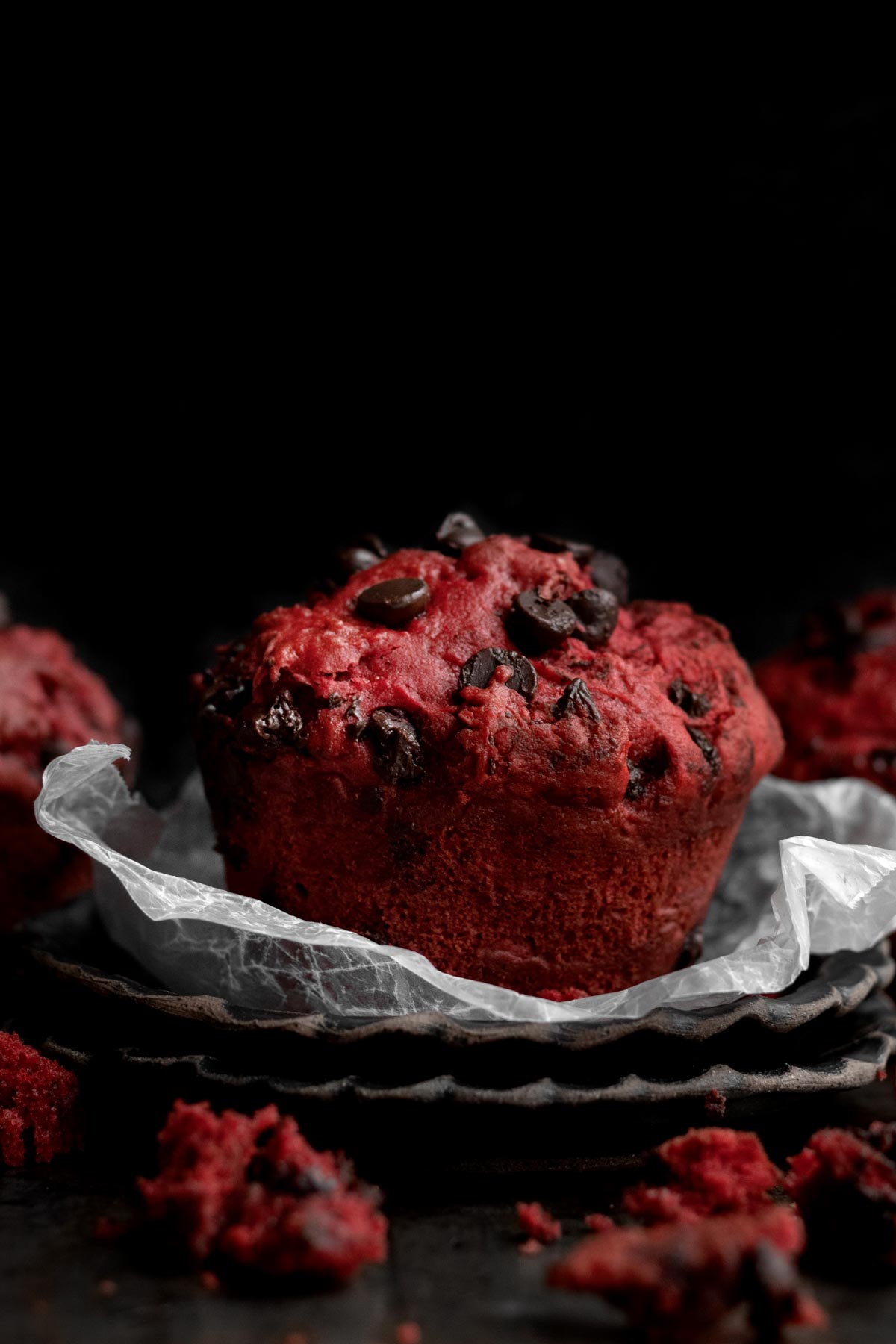 This gluten free muffin are crimson red and dotted in chocolate.