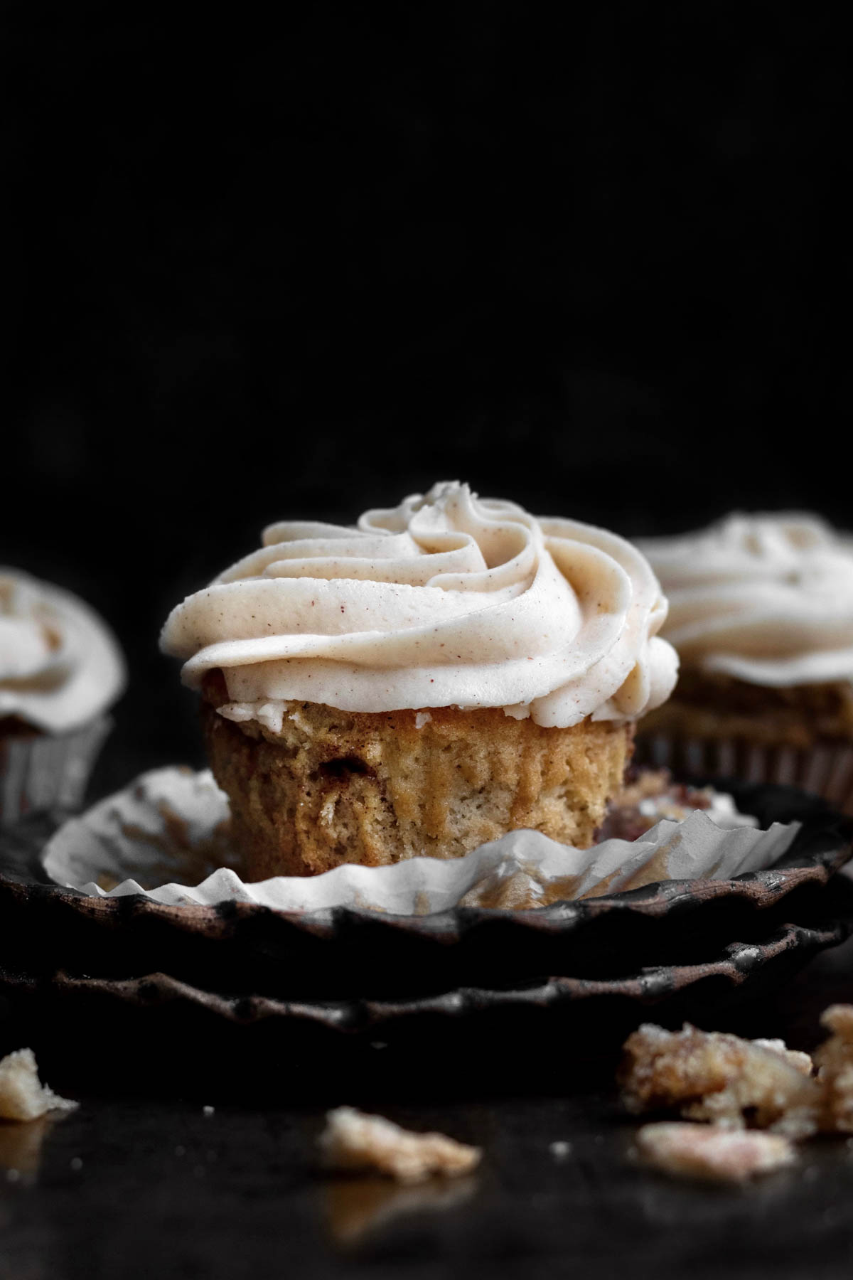 Snickerdoodle Cupcake with a swirl of cinnamon brown sugar buttercream frosting.