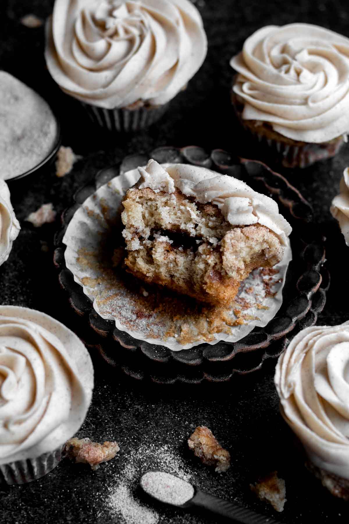 A Snickerdoodle Cupcake where you can see the cinnamon sugar inside.