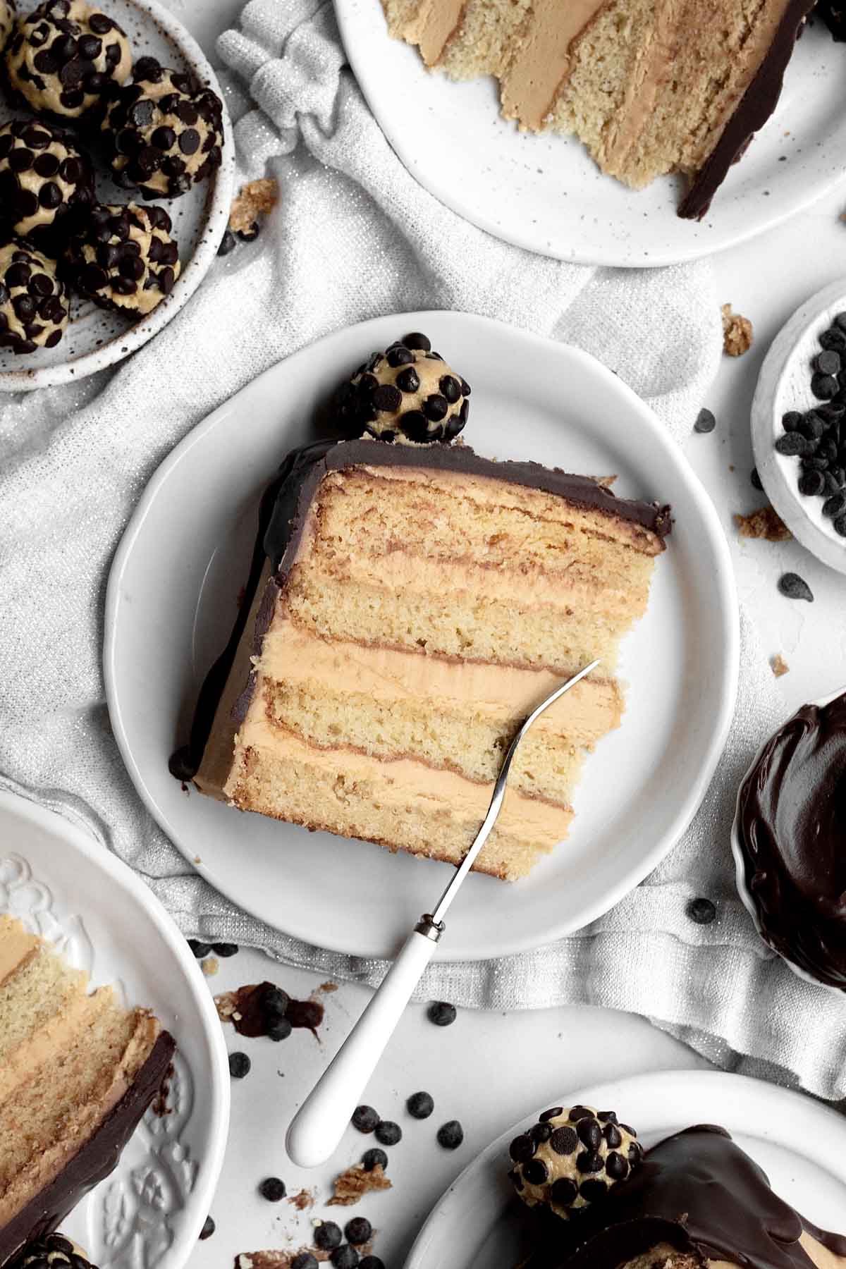 A slice of Wow Butter Cake sits diagonally on a plate.