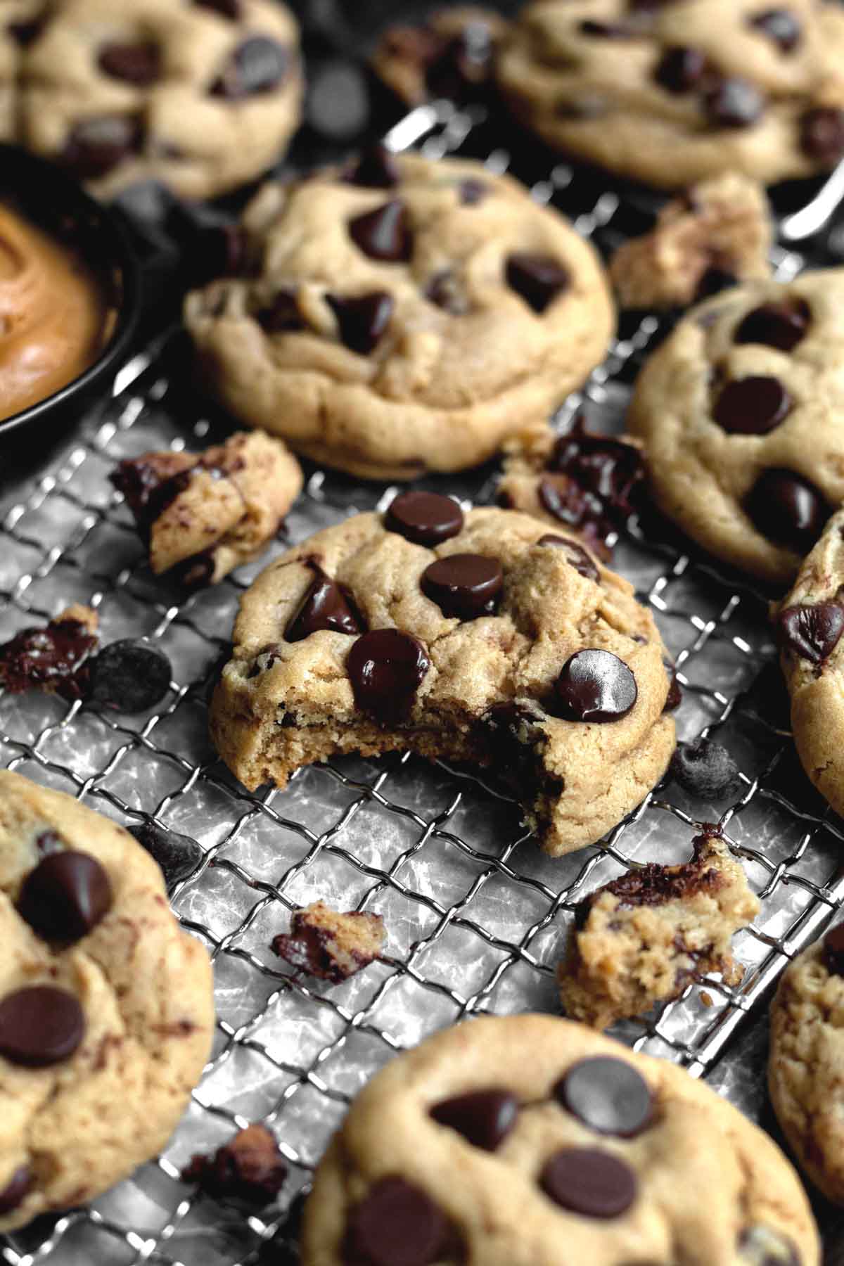 A half eaten Wow Butter Chocolate Chip Cookie.